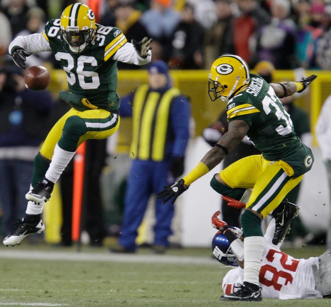 Green Bay Packers safety Nick Collins nearly picks off a pass intended for New York Giants wide receiver Mario Manningham during the second quarter of their game on December 26, 2010 at Lambeau Field in Green Bay, Wis.