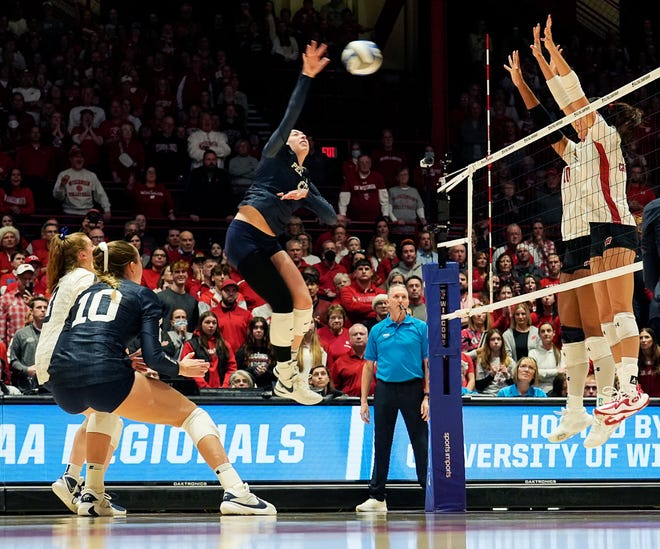 Penn State outside hitter Jess Mruzik (9) goes for a spike during the second set of the NCAA Regional Volleyball semifinal match against Wisconsin on Thursday December 7, 2023 at the UW Field House in Madison, Wis.