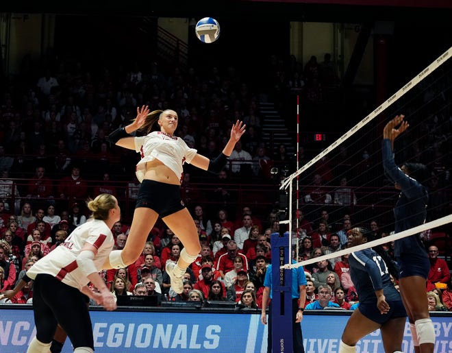 Wisconsin opposite Anna Smrek (14) goes for a spike during the first set of the NCAA Regional Volleyball semifinal match against Penn State on Thursday December 7, 2023 at the UW Field House in Madison, Wis.